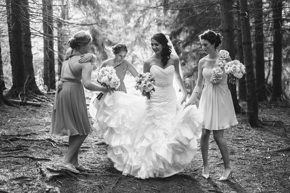 Bridesmaids Helping With Dress